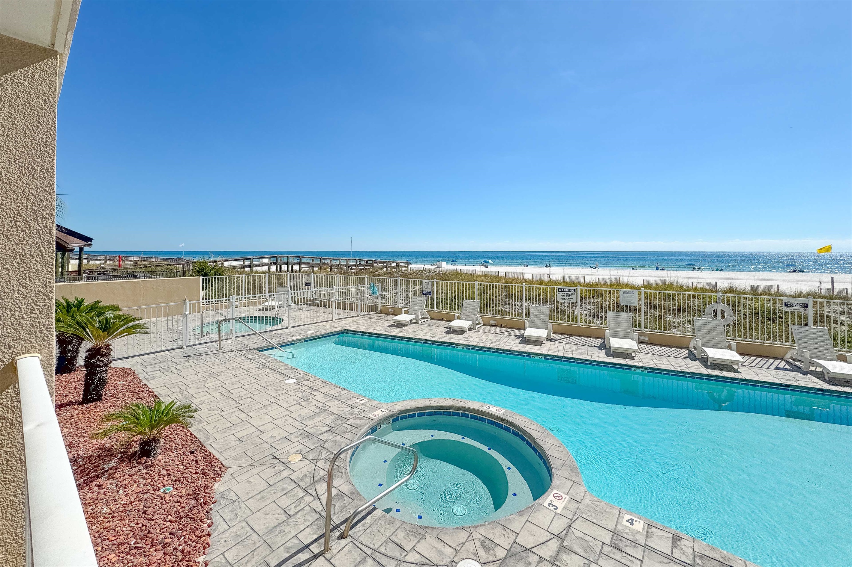 Enjoy the best of both worlds with direct beach access and a refreshing pool and hot tube with fenced kiddie pool on the side.  Your perfect coastal getaway awaits.