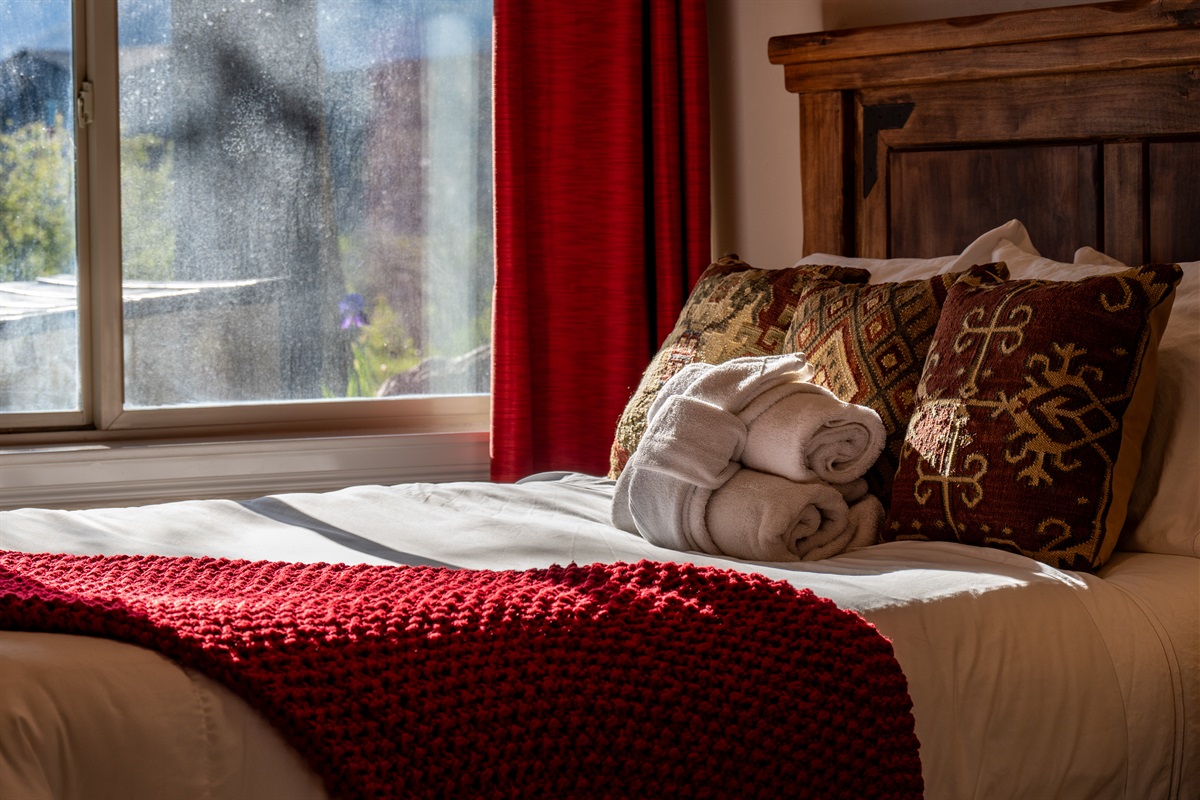 Cozy guest room details with welcoming touches and relaxing ambiance.