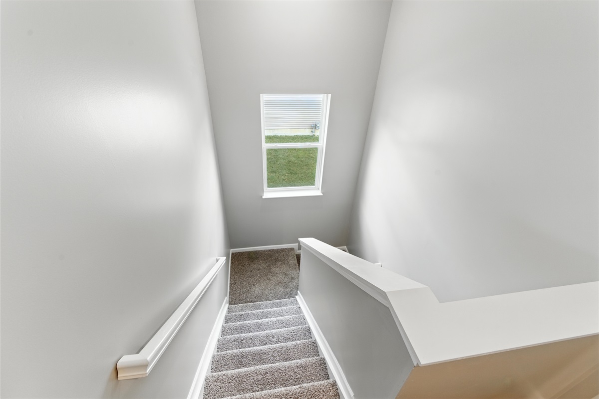 Clean, carpeted stairs offer added comfort