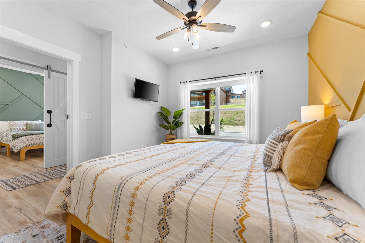 Main level king bedroom w/ ensuite bath