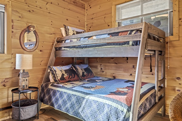 Please note, this room has been updated and now features one large Smart TV and twin/queen lengthwise bunk bed, pictures not yet updated.   The queen bed now has better access for both guests on each side along with better head clearance.