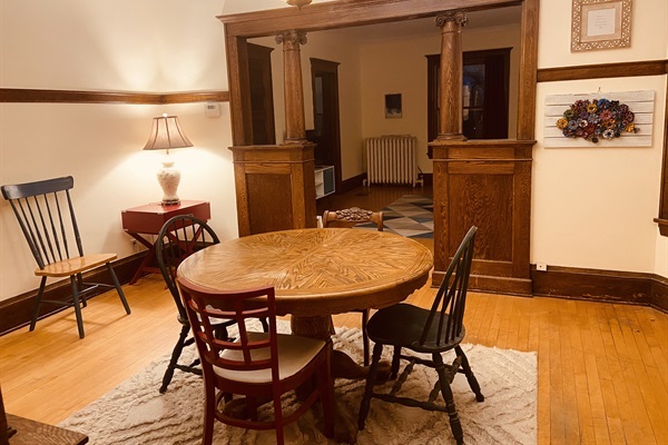Dining Room adjacent to living room and kitchen.
