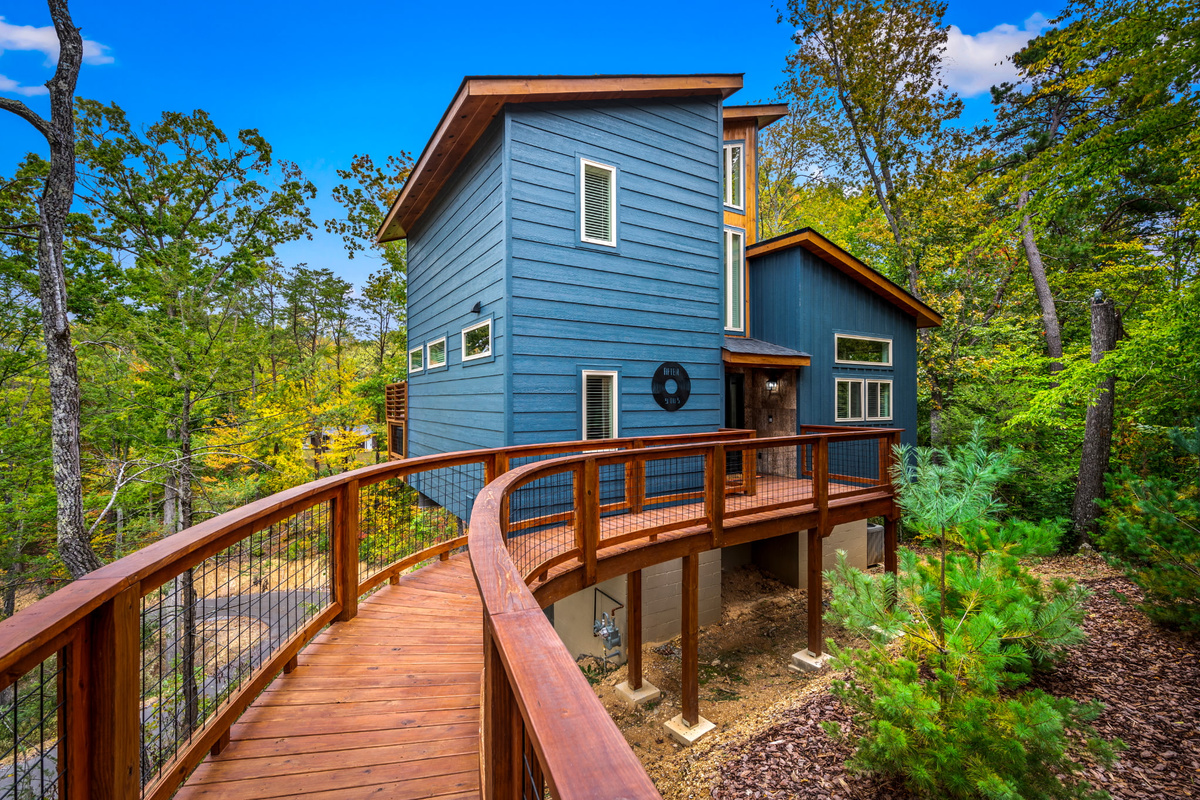 Less than 0.5 miles to Dollywood (hear the coasters from here) - private hot tub, balcony deck, surrounded by trees - built August 2025