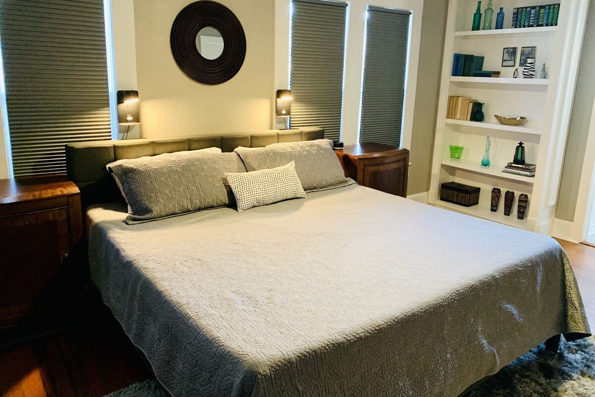 There are built-in lamps with usb chargers above the bed and large nightstands.