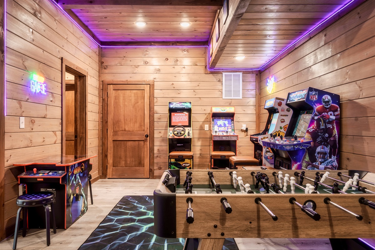 Game Room with multiple arcades and foosball table