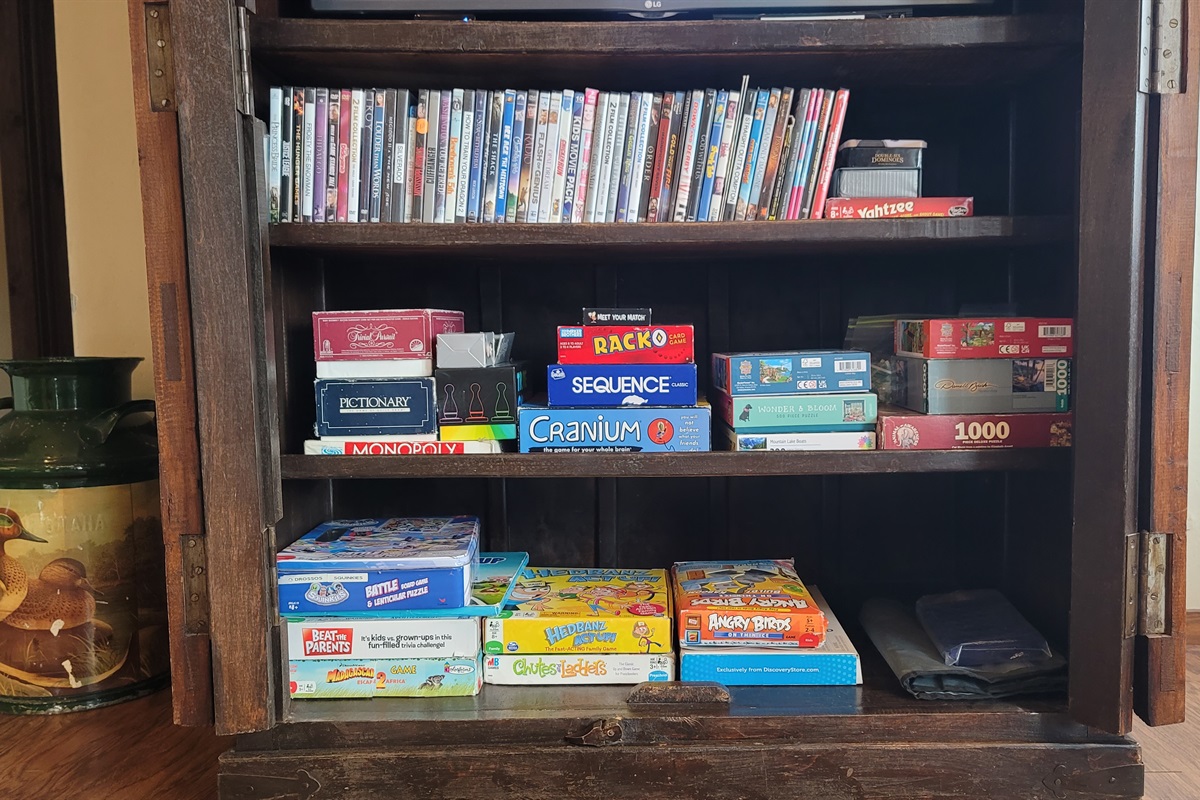 The armoire in the 2nd living area with a TV that plays DVDs and APPs and a Bluetooth soundbar on top to connect to your devices.  There is an assortment of games, puzzles, and DVDs for your enjoyment!