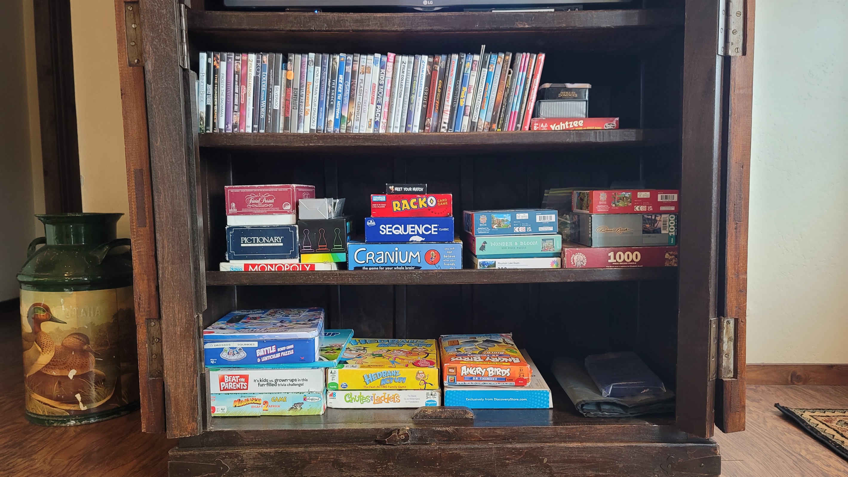 The armoire in the 2nd living area with a TV that plays DVDs and APPs and a Bluetooth soundbar on top to connect to your devices.  There is an assortment of games, puzzles, and DVDs for your enjoyment!