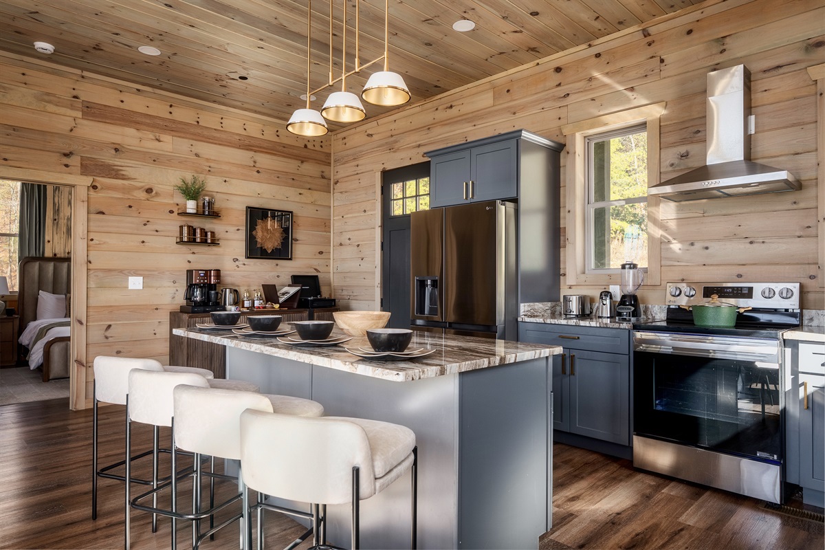 Spacious kitchen island for meals, snacks, and conversation. Everyone naturally gathers here.