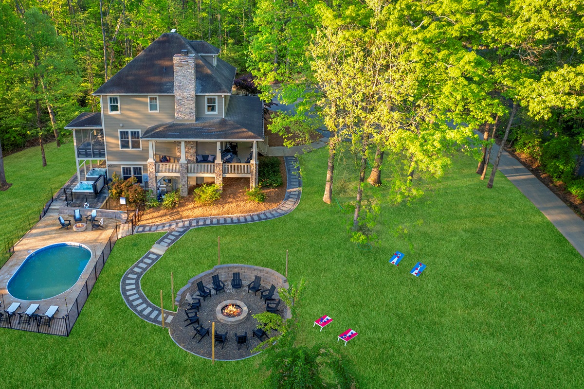 Spacious, serene, and made for connection — this private acre features a pool, 2 hot tubs, 3 fire pits, yard games, and forest views. The perfect Asheville setting for making unforgettable group memories.