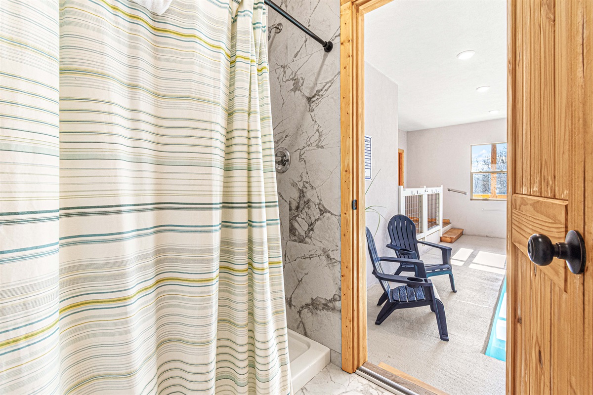 A spacious shower makes cleaning up after a swim easy peasy