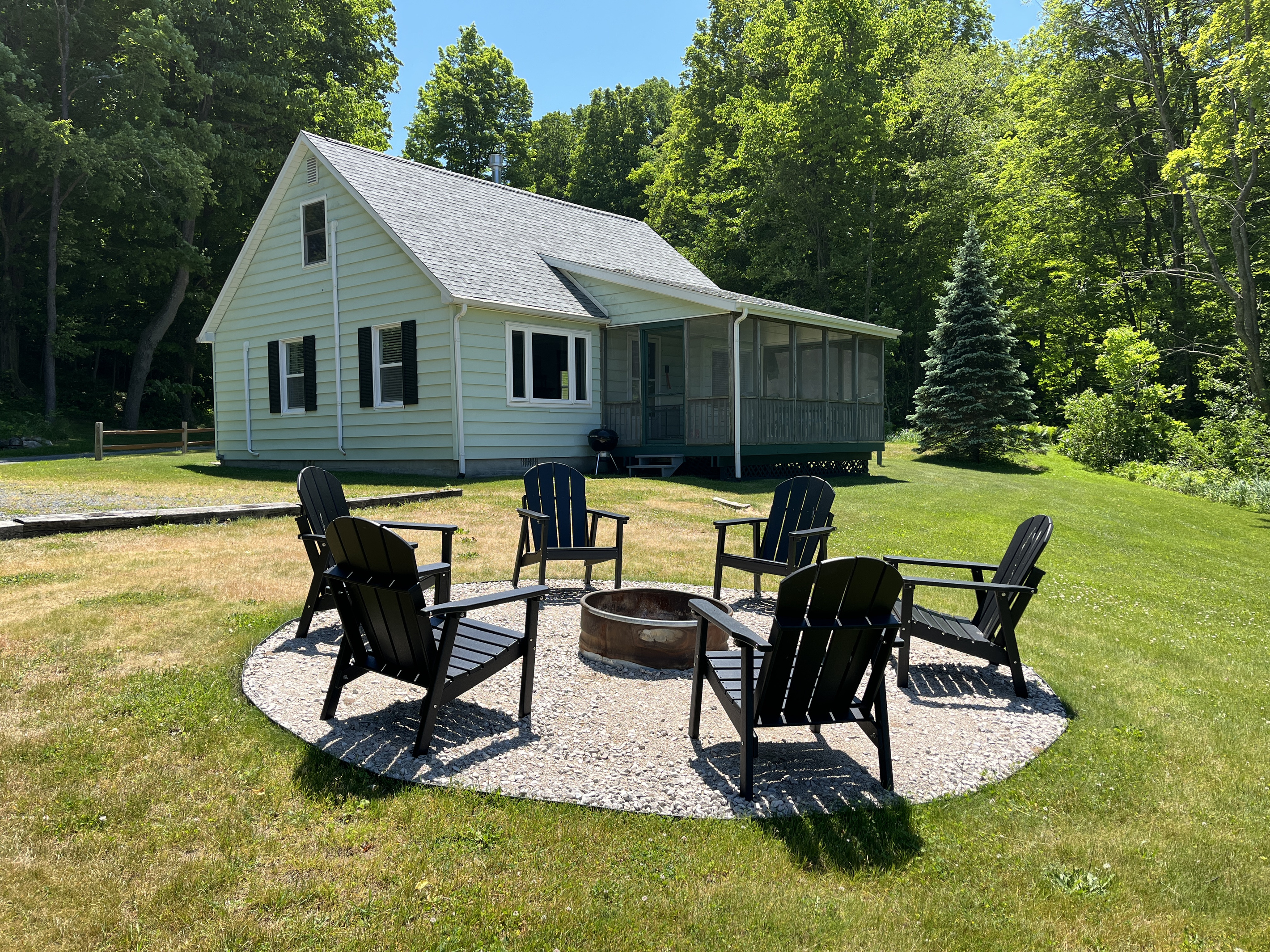 Screened in Porch and Fire Pit