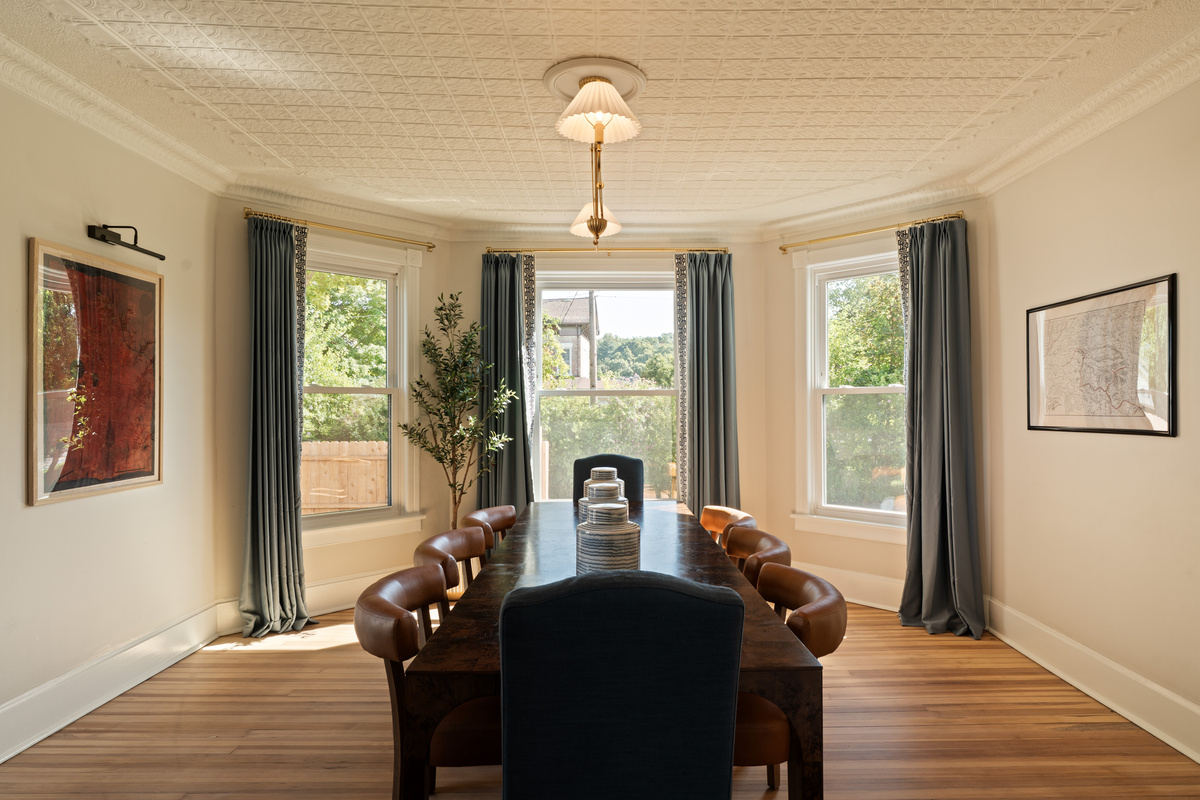 Gather around the dining table for breakfast before exploring or dinner after a day in the Catskills. The bright dining room offers plenty of space to reconnect over a meal.
