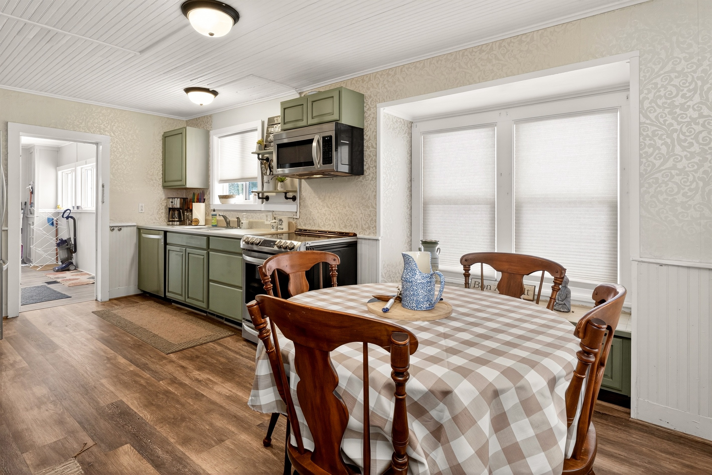 Spacious main floor kitchen with additional seating