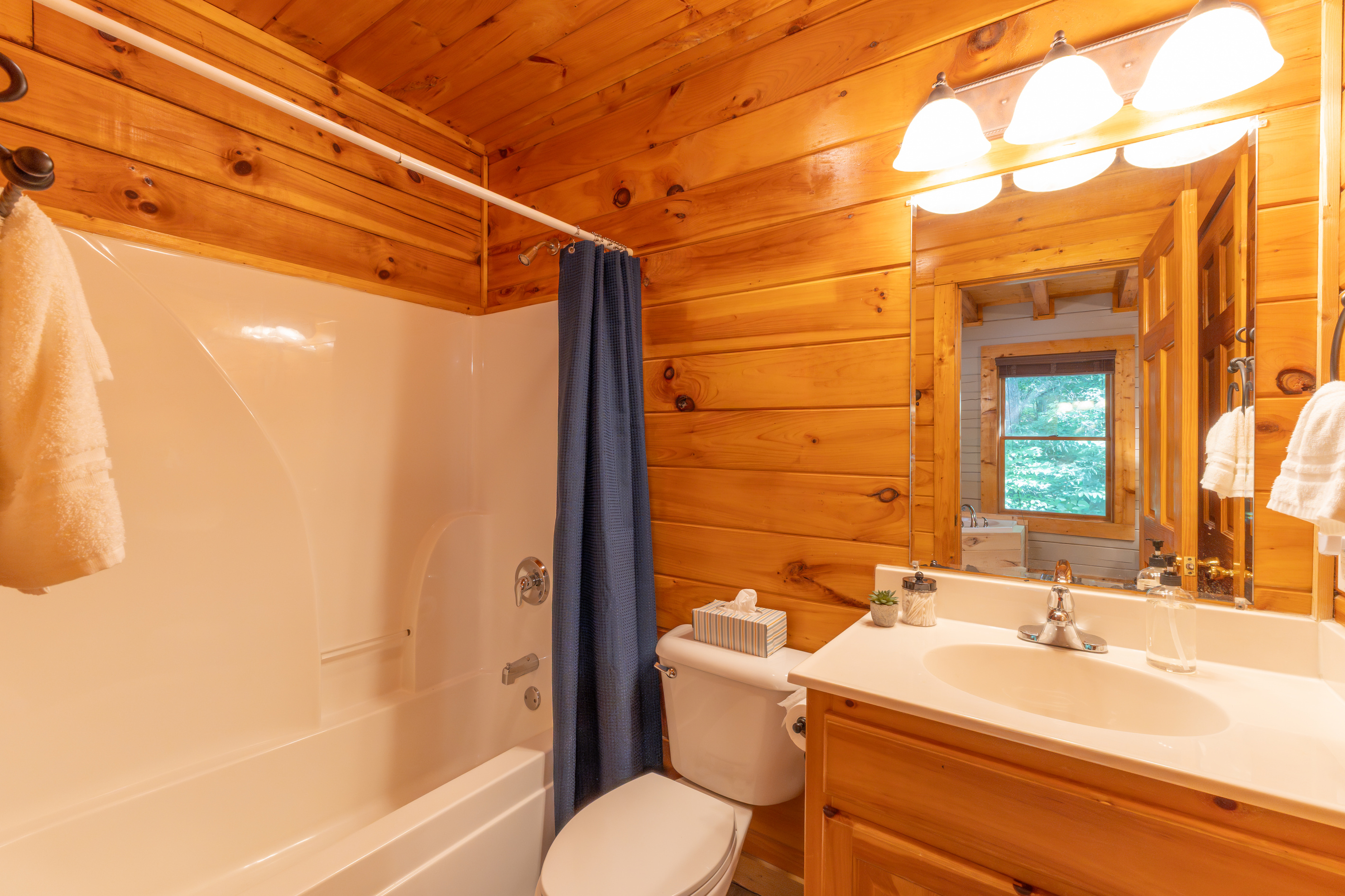 The main floor master bedroom ensuite bathroom conveniently doubles as the main floor bathroom.