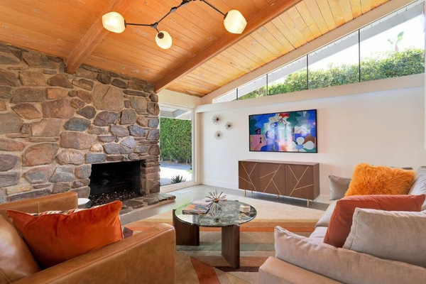 Great room with polished concrete floors and a gas fireplace