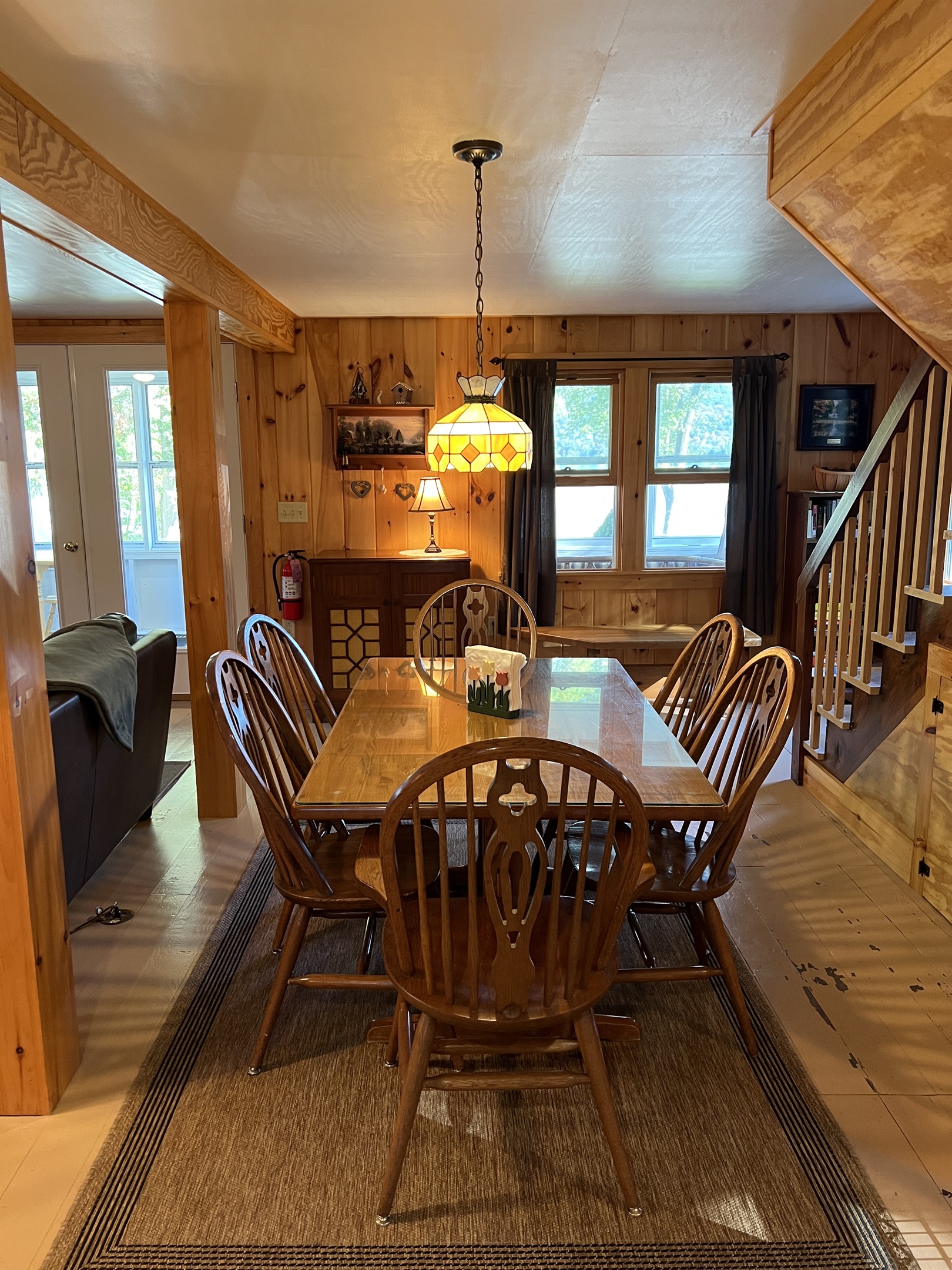 Dining room table seating for 6, with views of the lake out the front windows.