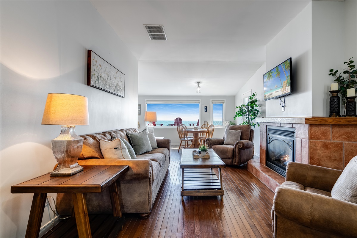 Warm, inviting space with panoramic lake scenes