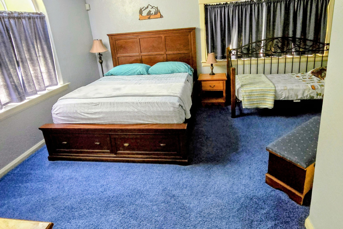 Bedroom 2 with Calking and a twin above garage