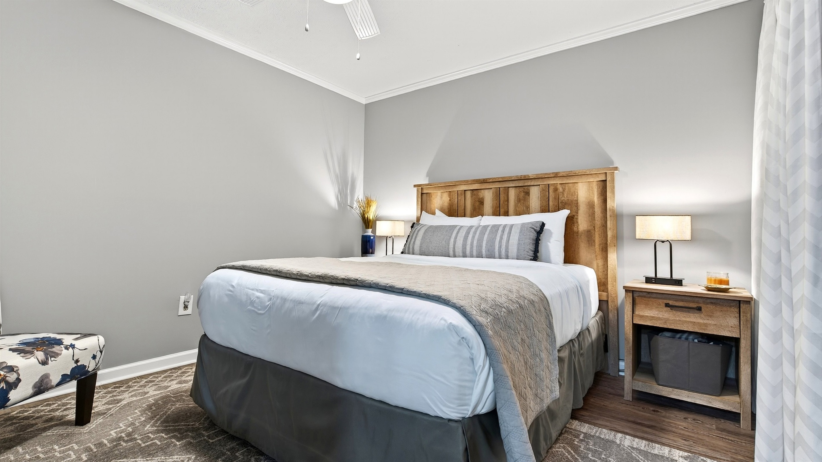 Lower level bedroom with a queen size bed