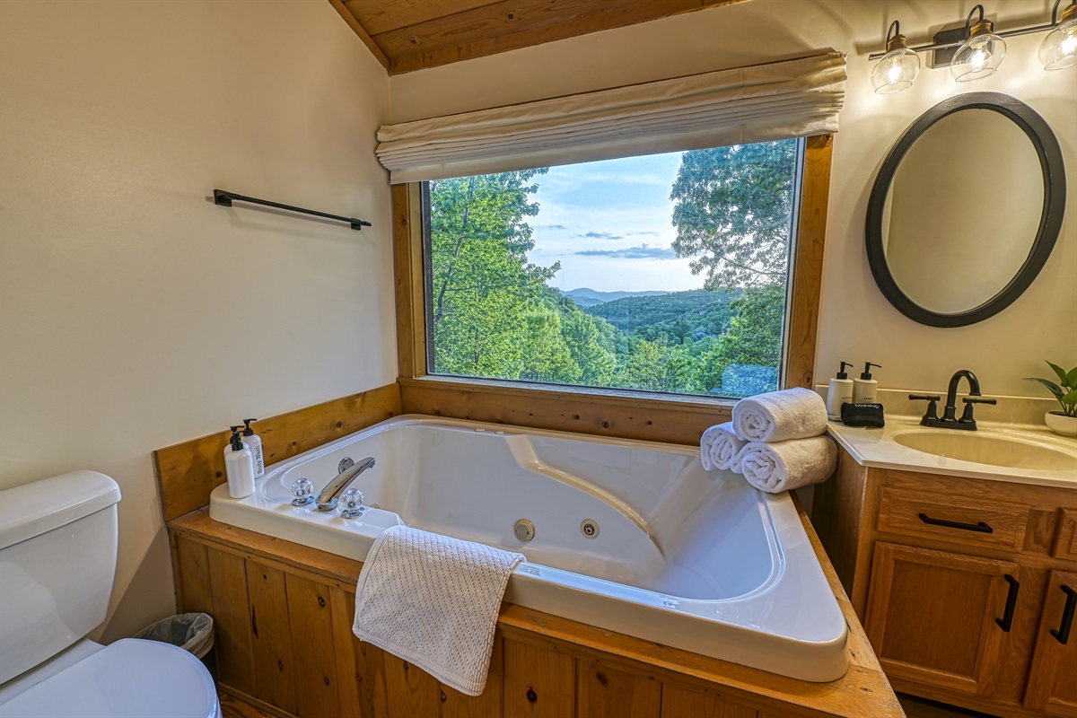 The upstairs bathroom is shared with the king bedroom and loft bed. Perfect place to soak and watch the sunset after a long day of hiking.