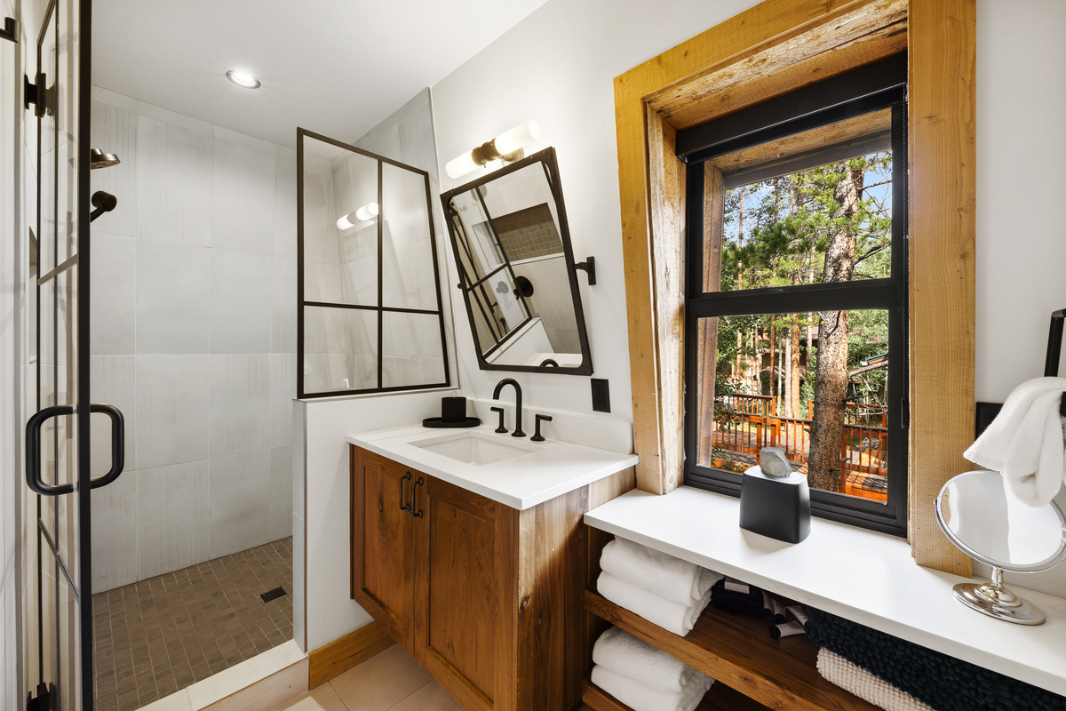 Upper level bathroom for guests sleeping in loft or twin-over-queen bunk room. Toilet has a separate water closet so that more than one person can be using this bathroom at a time. 