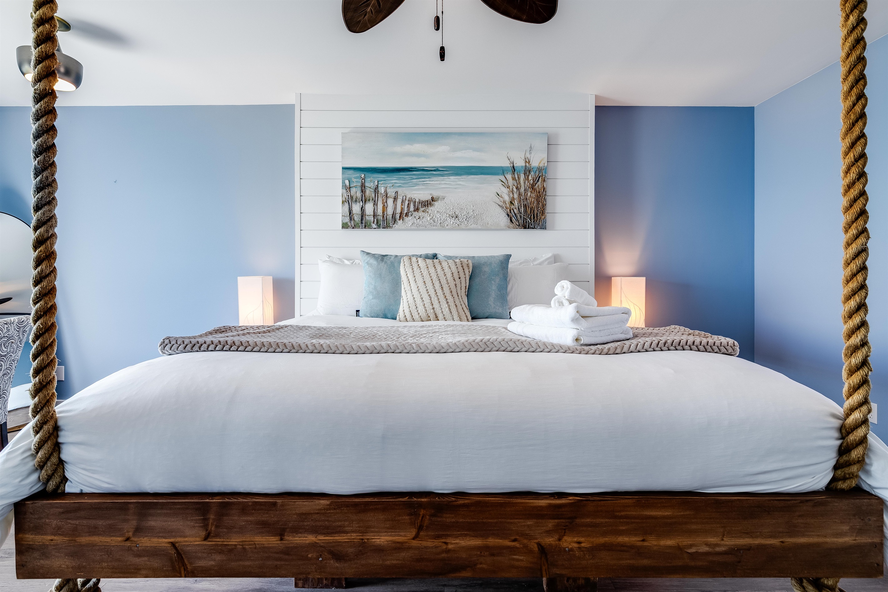 Master Bedroom with King bed and access to second story balcony with calming lake views