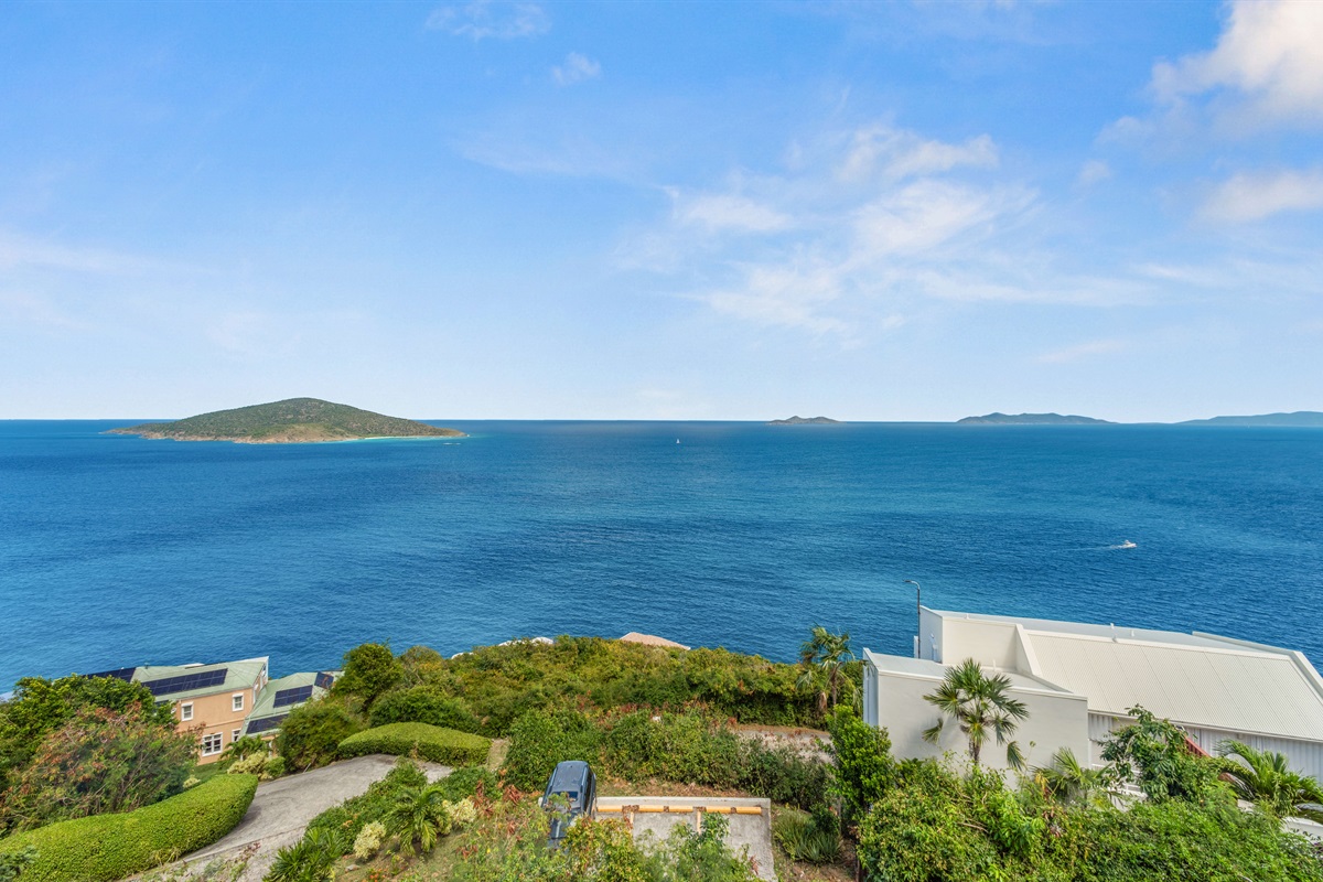 Where ocean and sky meet; your serene island backdrop.