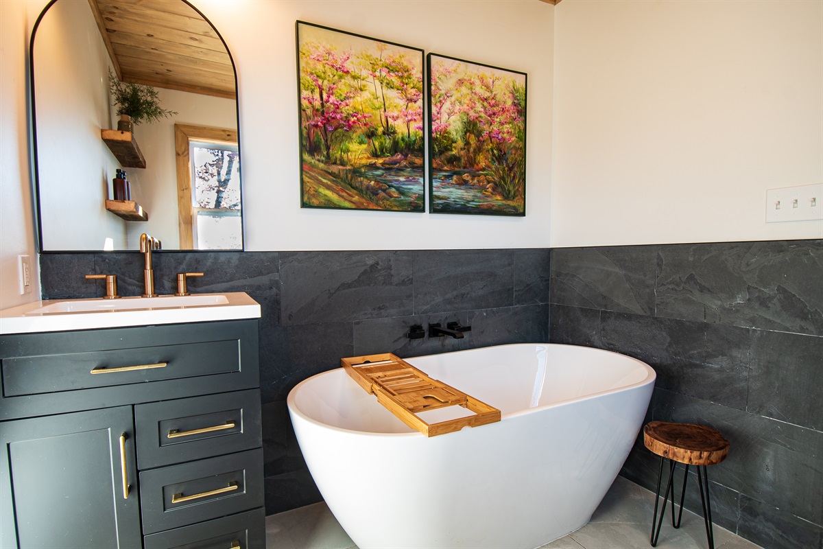 Unwind in our soaking tub in the primary bathroom.