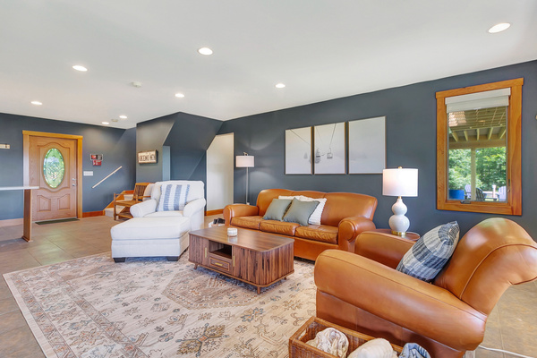 First floor living room is a great space to relax. One of two living rooms. 