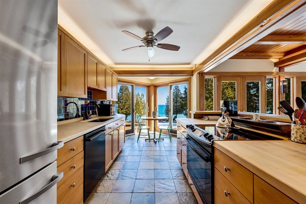 Meili refrigerator, GE oven, Bosch dishwasher, Door County stone countertops...and the lake in view the whole time!
