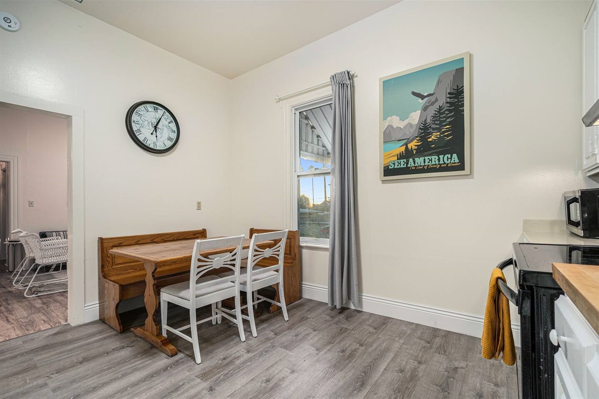 Cute booth dining area located in the kitchen.