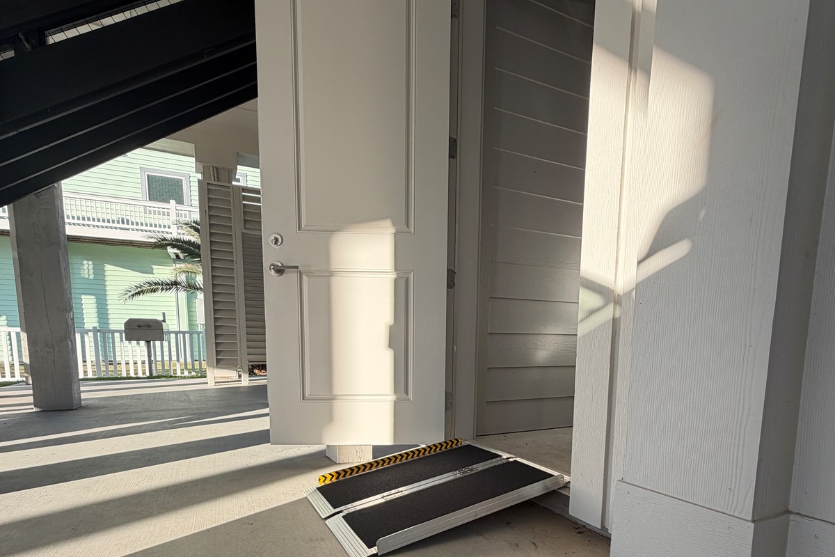 Costa Cristal Exterior: Exterior view showing the wheelchair-accessible ramp, ensuring comfortable and inclusive access for all guests.