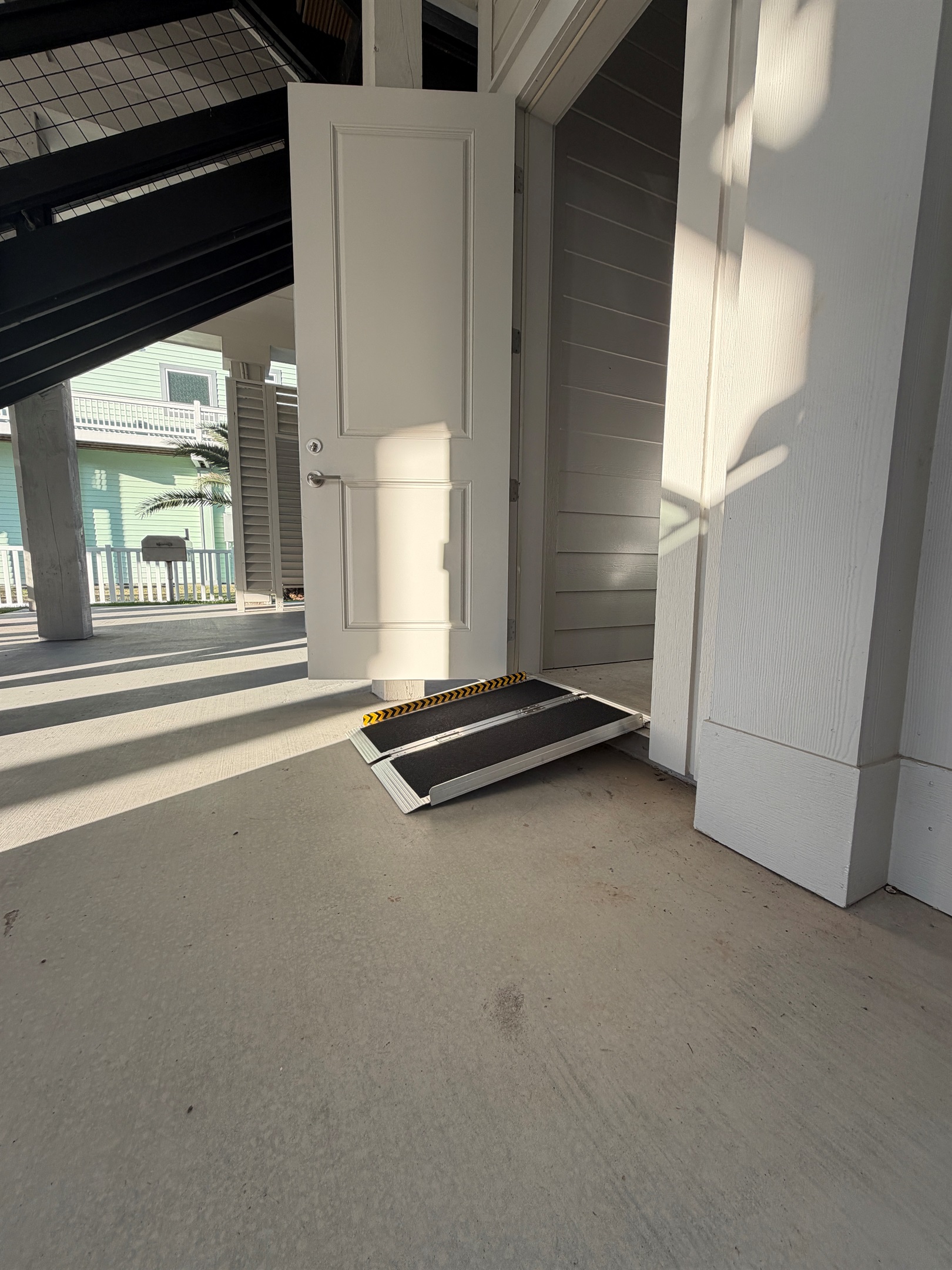 Costa Cristal Exterior: Exterior view showing the wheelchair-accessible ramp, ensuring comfortable and inclusive access for all guests.