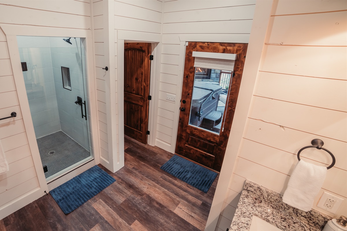Master Bathroom 1 with door to back deck