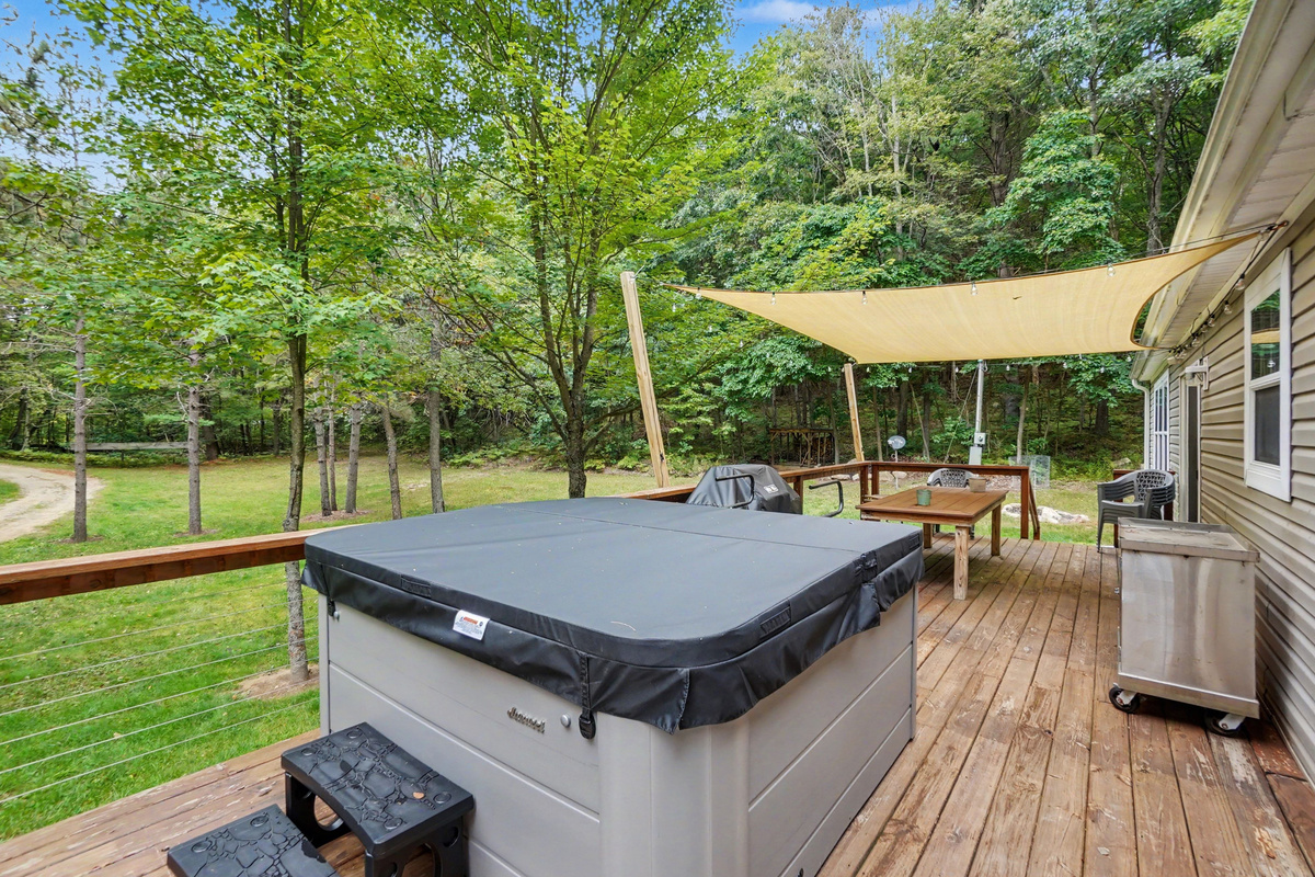 Deck with hot tub.