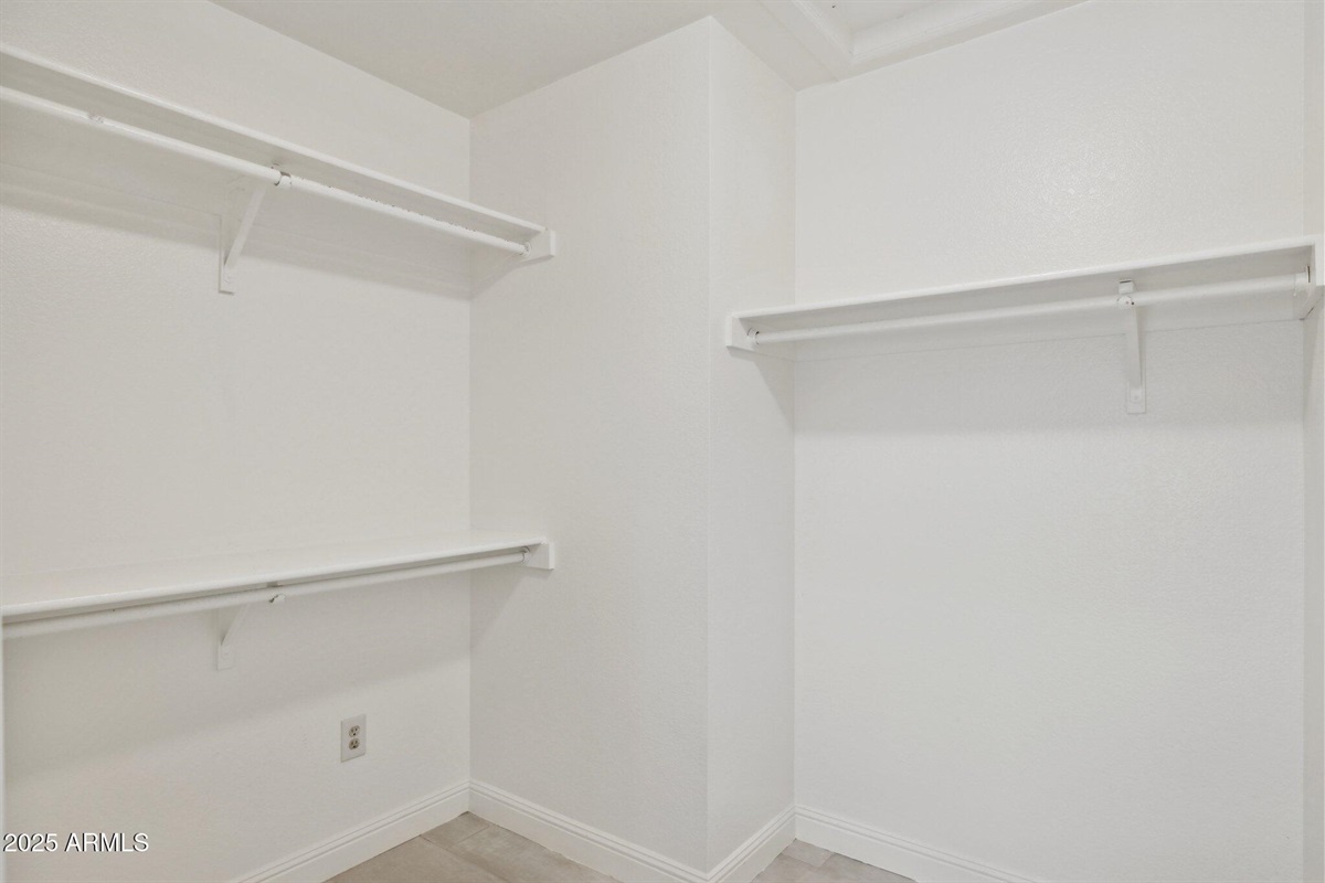 Spacious Primary Walk-In Closet