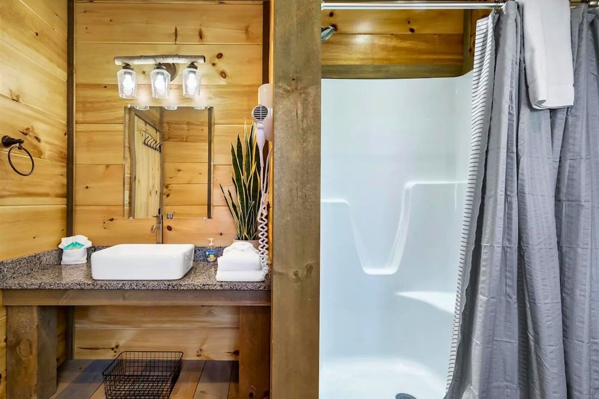 Walk In Shower and Bright Vanity in the Queen Ensuite Bathroom