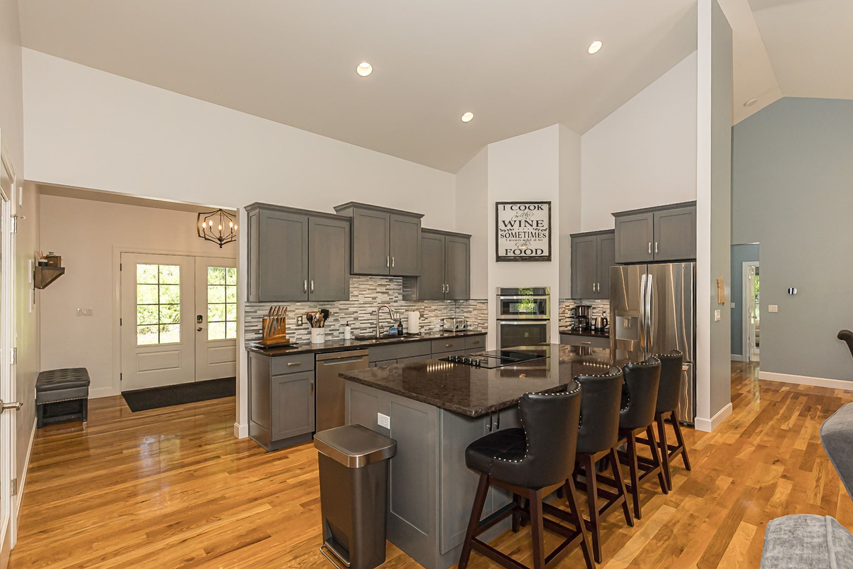 The kitchen opens to the dining and living areas for easy entertaining.