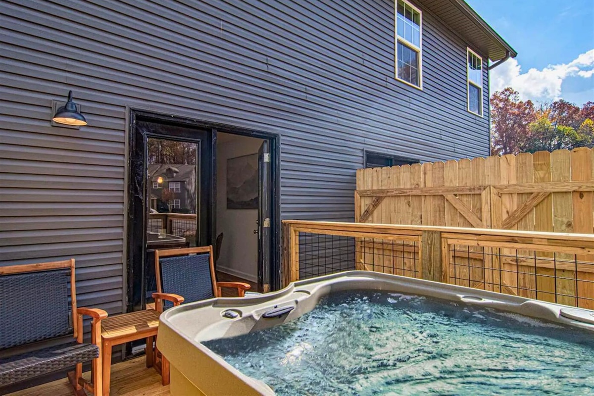 Take a dip in your private hot tub on the deck, the perfect spot to relax after a day of exploring
