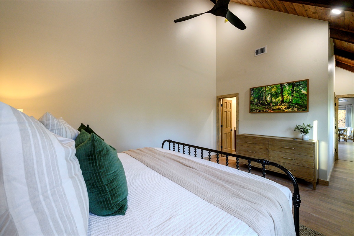 Private king suite upstairs with forest views and clean, modern finishes 🌲✨