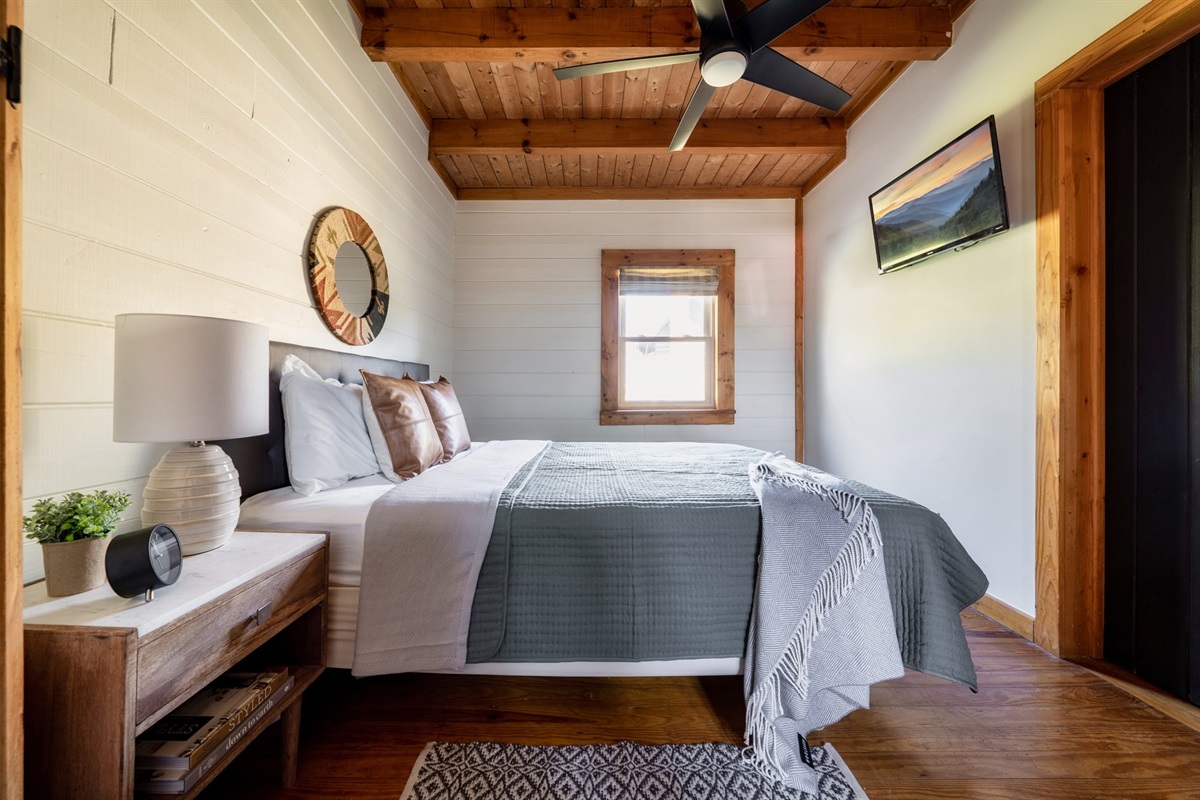 Sink into serenity in our cozy bedroom, where comfort meets tranquility.