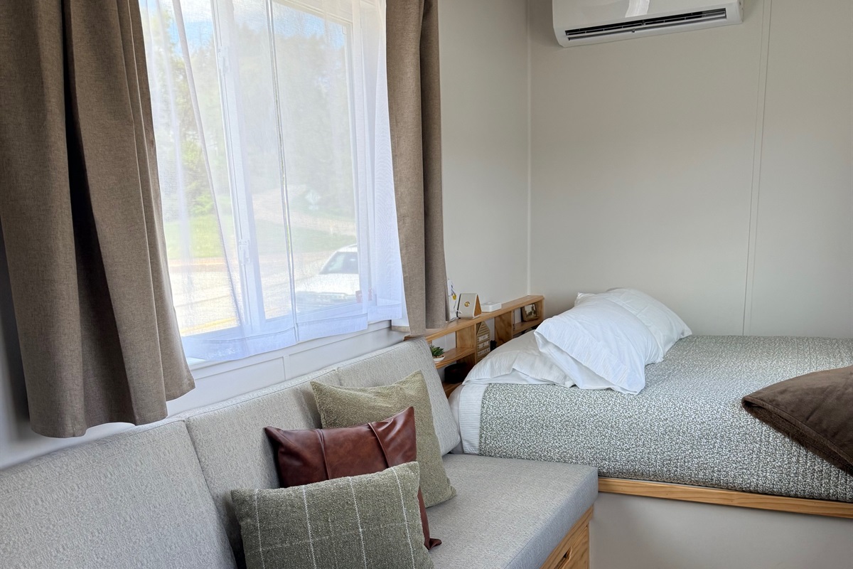 Custom couch and a Queen Size bed