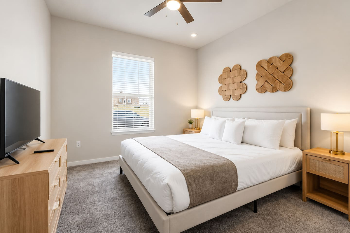 Bedroom 2, features a queen-size bed and a TV, perfect for relaxing! 