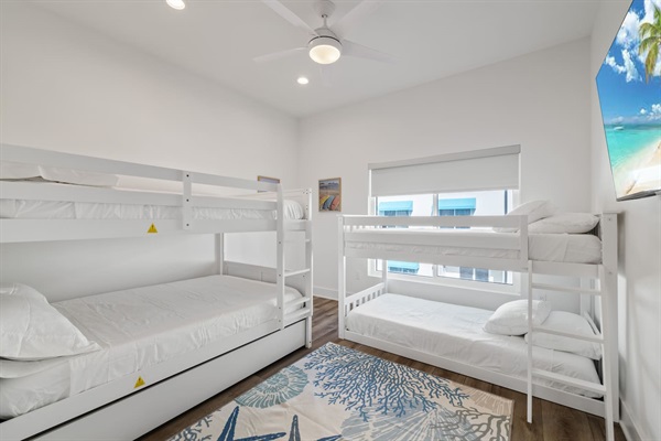 Bunkbed Room with an extra pullout twin. That's 3 twins and 2 fulls in one room!