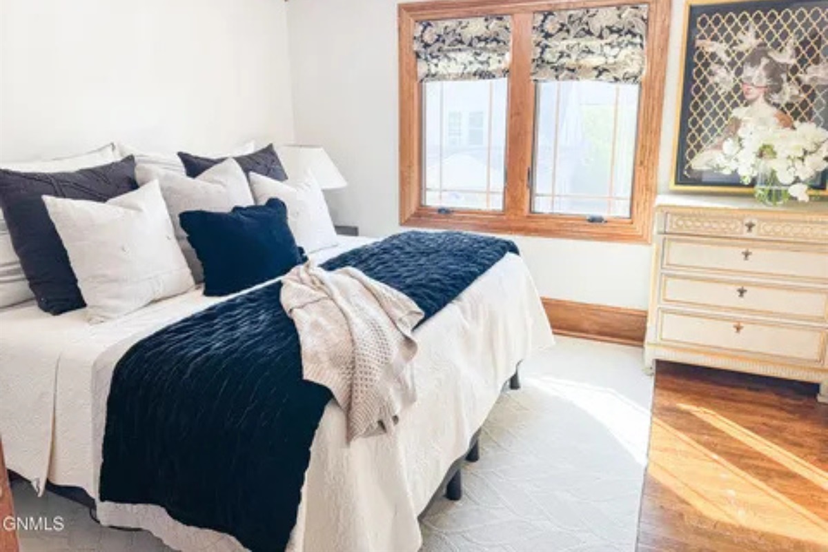 A simple, peaceful room where you can settle in and feel right at home.