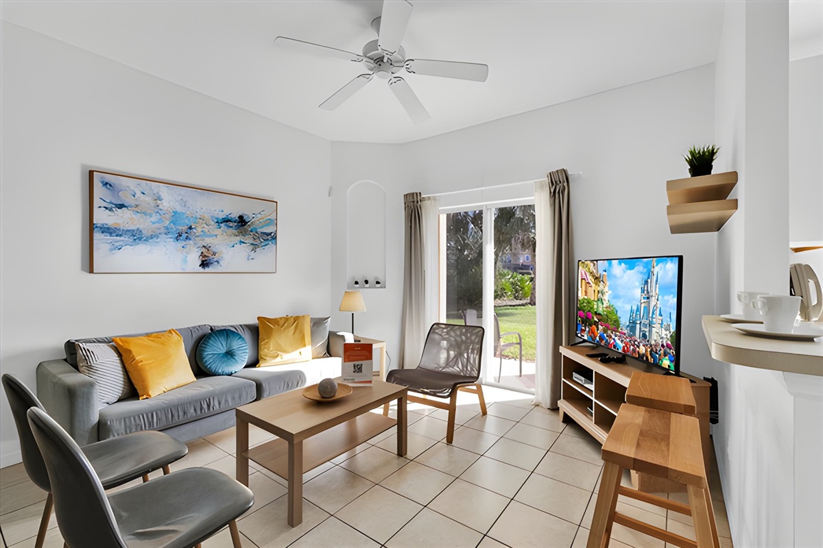 From the living area, you have a lovely outdoor view. And the open floorplan integrates the living and dining areas for you to enjoy family time during your stay.