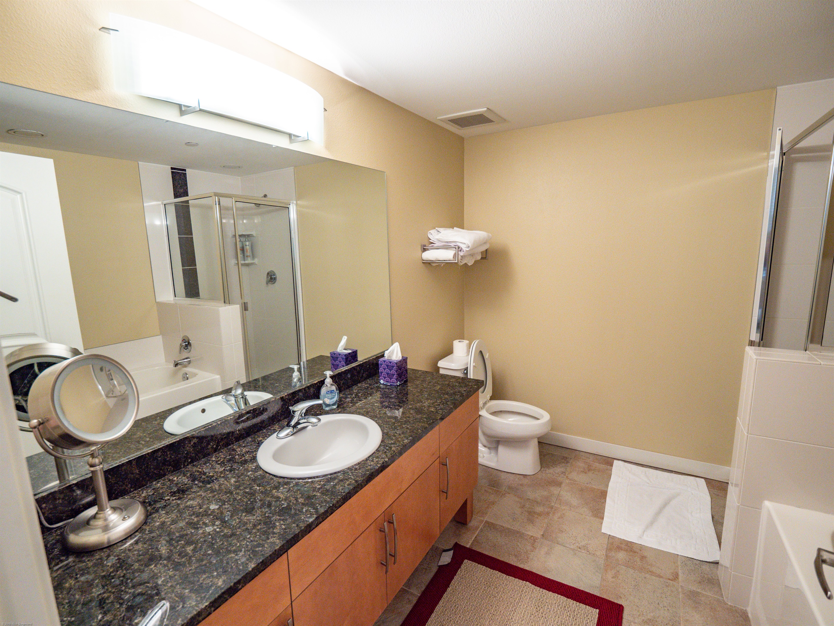 both bathrooms have makeup mirrors