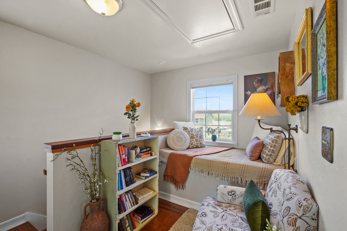 A cozy little reading nook for relaxing with a book, unwinding, or taking a peaceful nap.