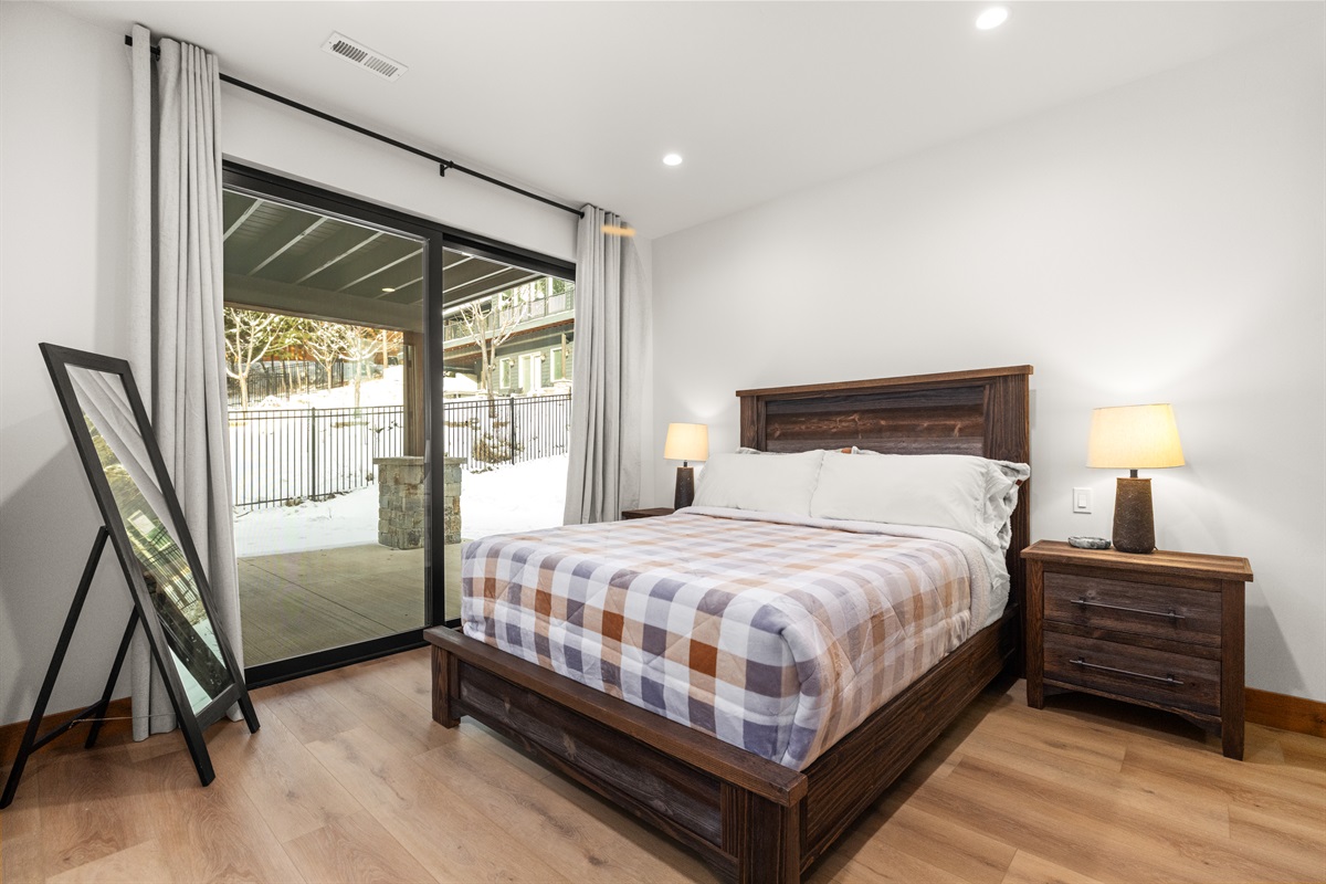 Main floor queen bedroom with private ensuite. 