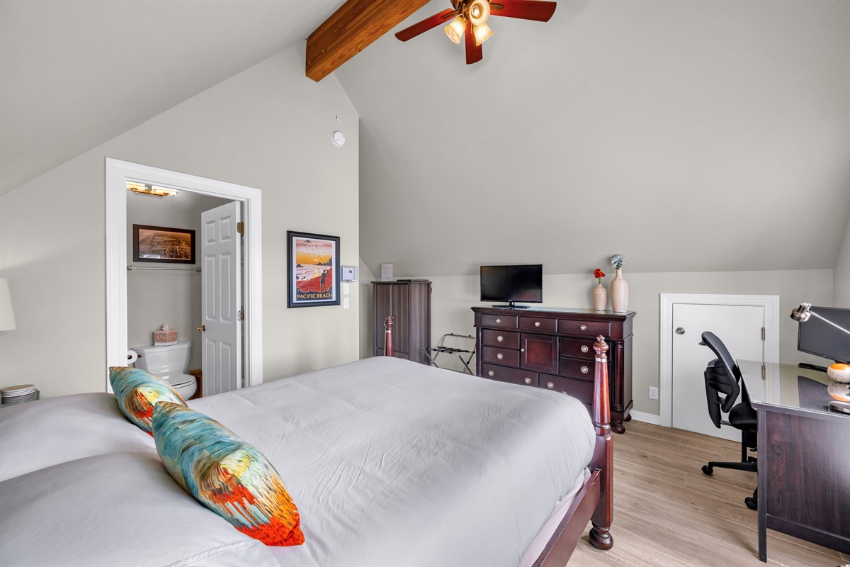 Upstairs front bedroom sports a Queen memory foam mattress, high quality linens, 30" smart TV/cable
